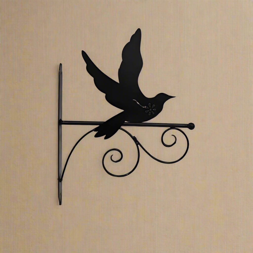 Bring a touch of whimsy to your home with this Bird Silhouette Wall Hook! This unique piece of decor is the perfect addition to any entryway, bedroom or living space. Crafted from sturdy iron, this black bird is sure to make a statement. The minimalist design allows you to hang your favourite coat, purse or keys and adds a touch of character to any room. With its versatile design, this wall hook is sure to be a conversation starter. Let your bird-loving style shine through with this fun and functional wall