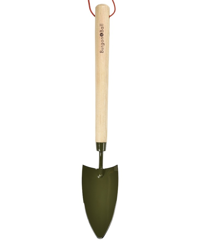 Small gardening trowel with a wooden handle on a white background Burgon &amp; ball trowel