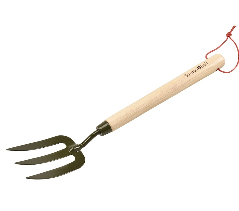 Gardening tool with wooden handle and metal prongs on a white background