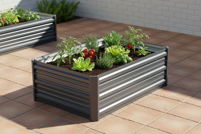Greenfingers 80x60x30cm galvanised steel raised garden bed in cool aluminium grey on sunny Australian patio with tomatoes and herbs growing